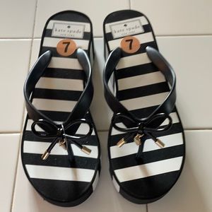 Black and white Kate Spade Flip Flops size 7